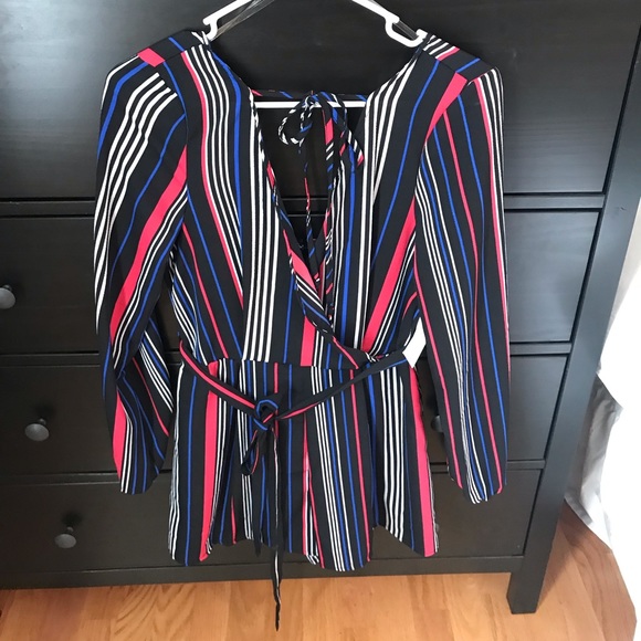 Dresses & Skirts - Romper never worn. Perfect for game day!!!